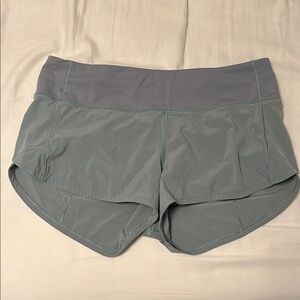 Slate Gray/Blue Lululemon Shorts with Curved Hems and Elastic Waistband